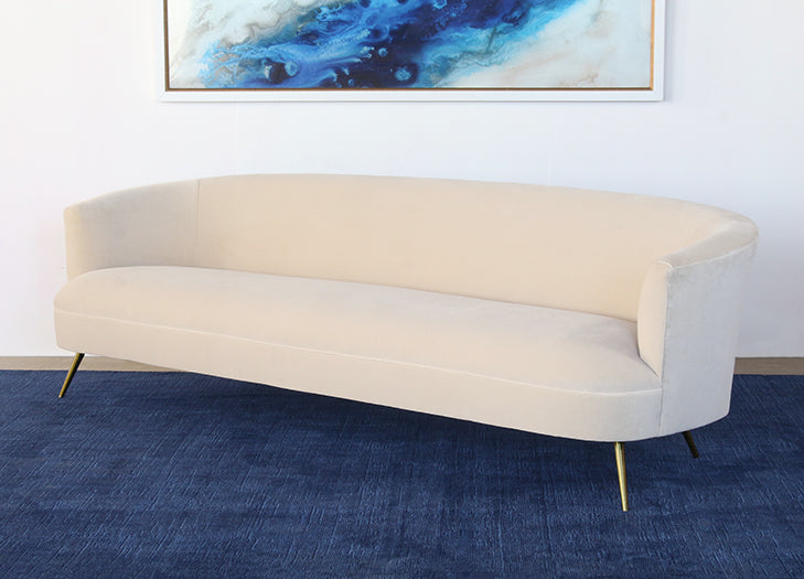 Curved Sofa With Tight Back And Antique Brass Legs