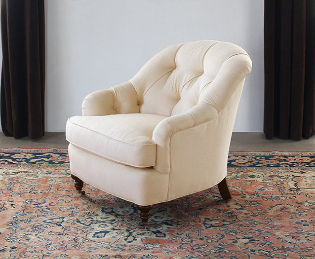 Tufted Back Club Chair in Linato Cream with Black Walnut Turned Legs