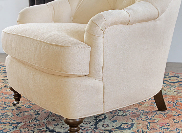 Tufted Back Club Chair in Linato Cream with Black Walnut Turned Legs