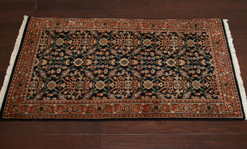 2'11" x 5'4" Brick and Navy Oriental Rug