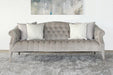 SF208 - Tufted Camelback Sofa